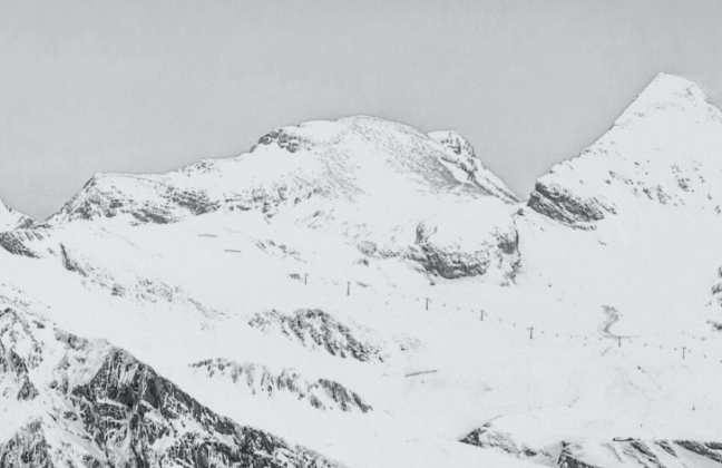 Greyscale snowy mountain peaks